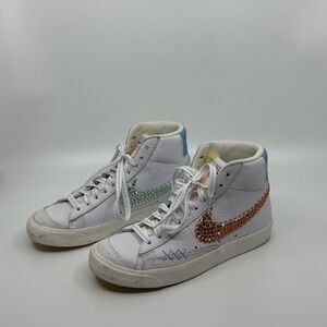 Nike Women's White Sneakers with Orange and Green Accents